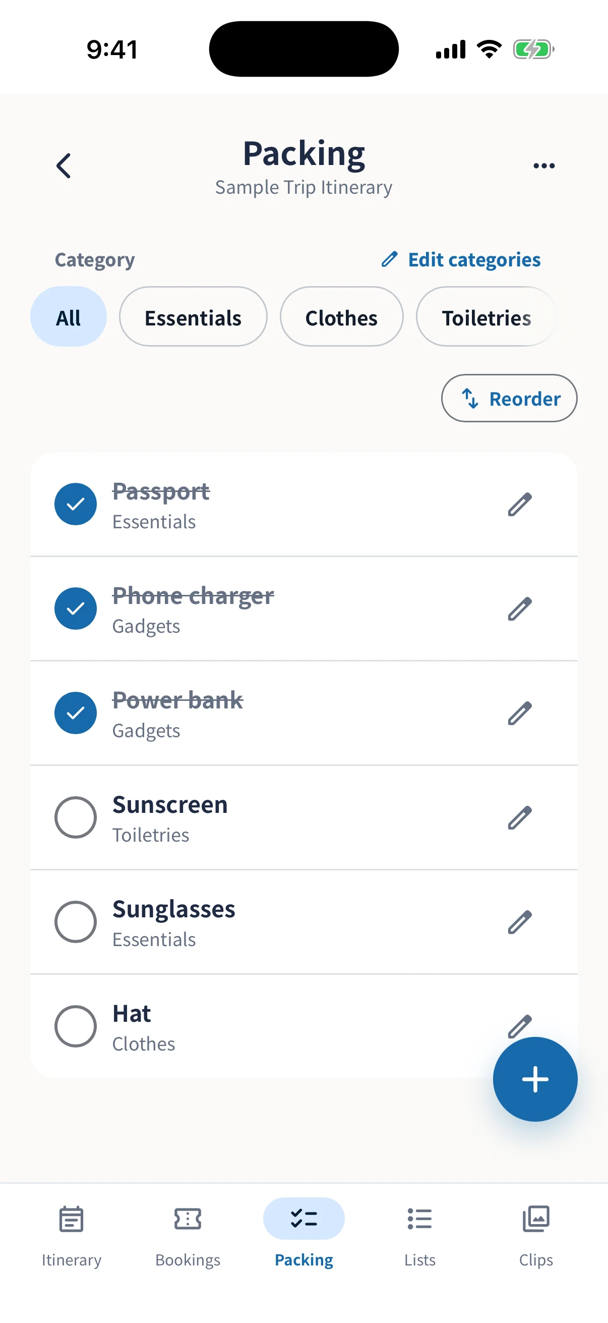 Packing checklist with categories, completed items, and reorder controls